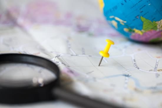Yellow pin on the map with magnifying glass